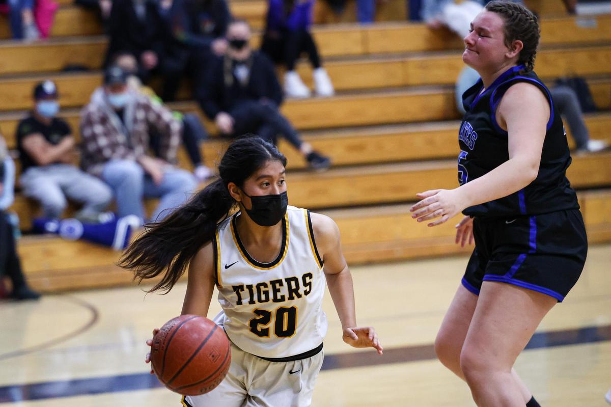 Mizuki Salomon-Gaspar takes the ball down court as Morro Bay won over San Luis Obispo 39-25 on Feb. 4, 2022.