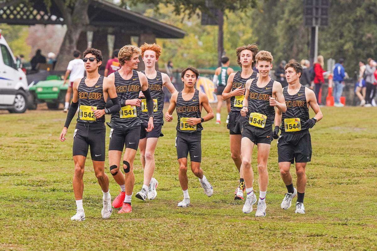 SLO High’s boys cross country team runs.
