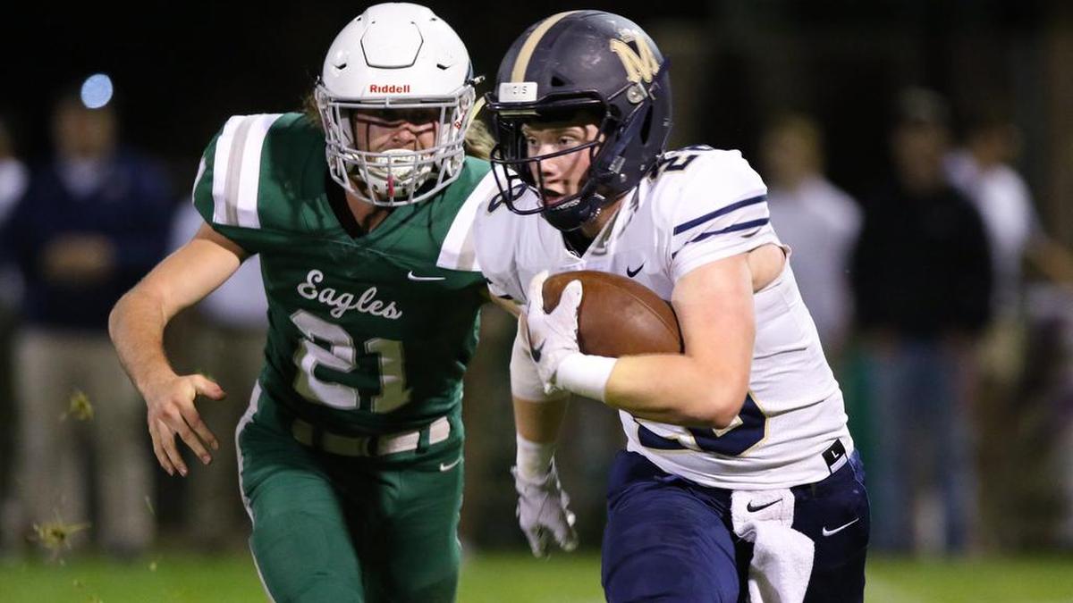 Brian Kowall is pursued by Michael Avery. Mission Prep plays at Templeton as the two top teams in the Ocean League face off. David Middlecamp 10-25-2019