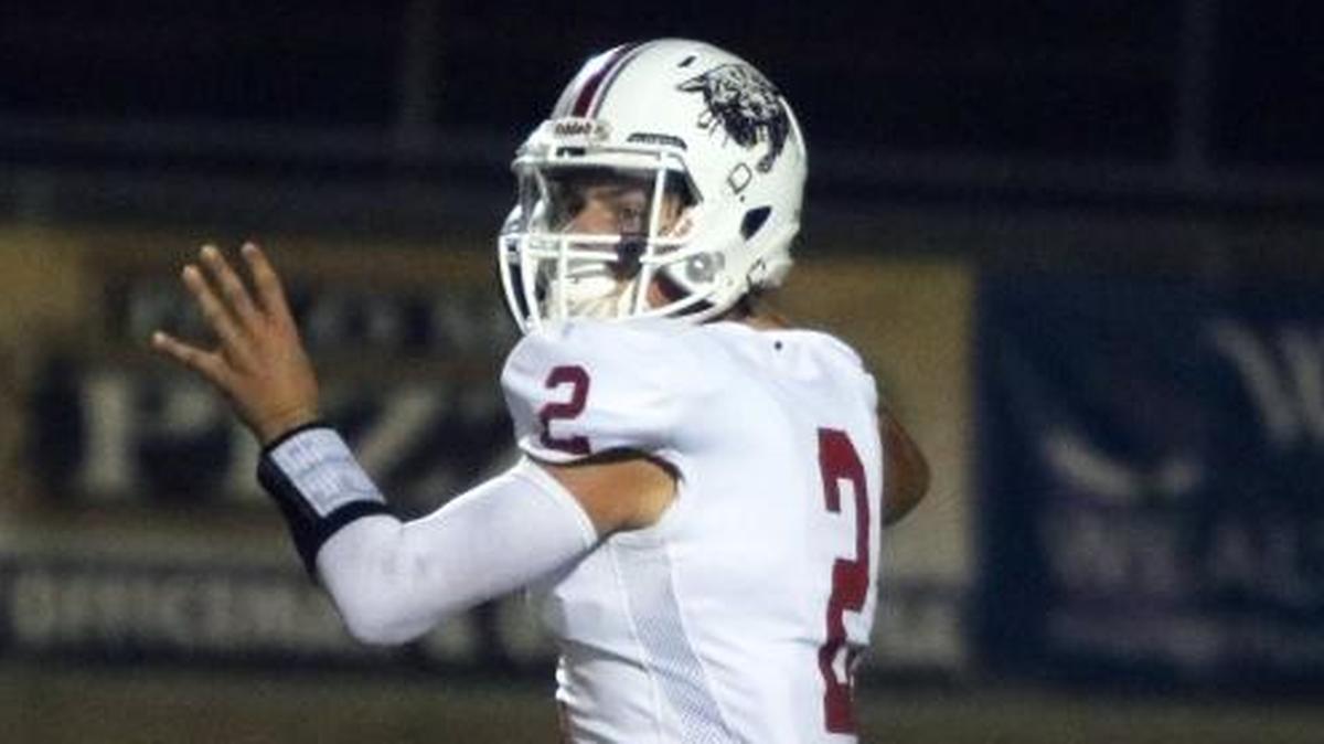 Paso Robles sophomore quarterback Hunter Barnhart winds up before being sacked by Arroyo Grande junior Tyler Valenti last Friday.