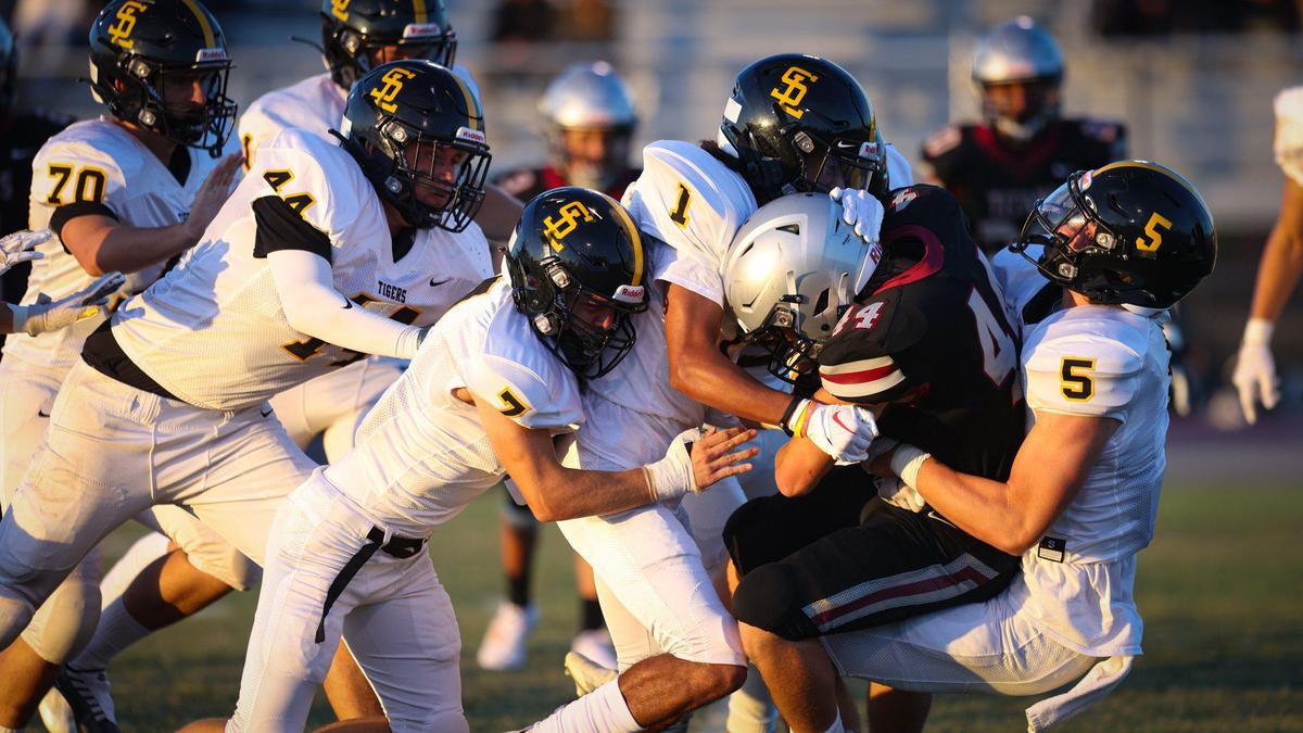 Nipomo’s Ian Ackerman is stopped by the Tiger defense. San Luis Obispo beat Nipomo 35-0 in the opening game of the season Aug. 19, 2022.