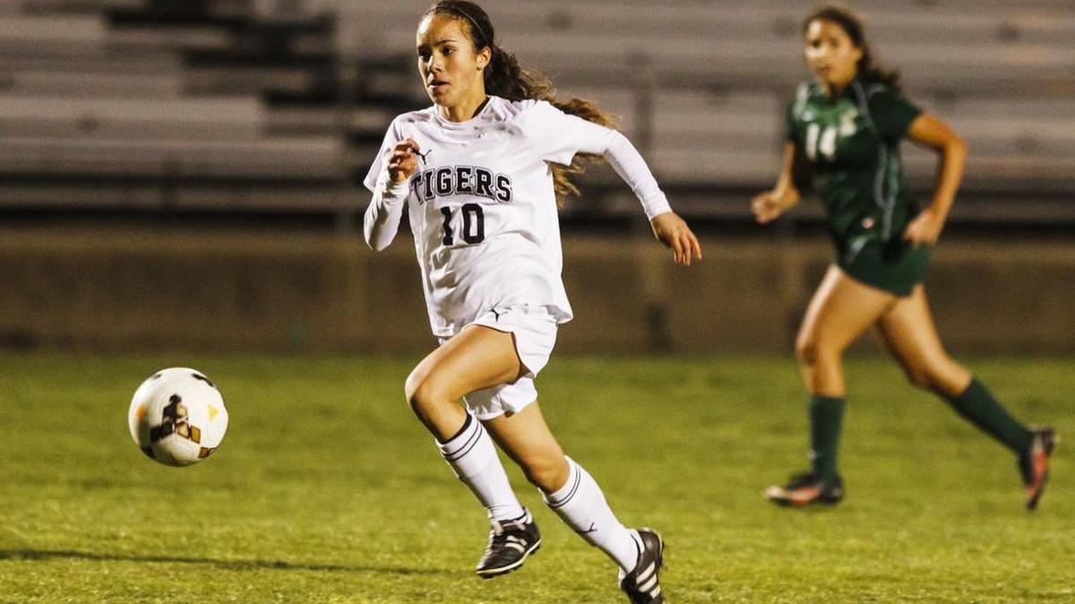 San Luis Obispo’s Amelia Corpuz-Carr charges the goal on the way to her first goal against Liberty in the first-round of the CIF Southern California Regional Division 3 Soccer Championships.