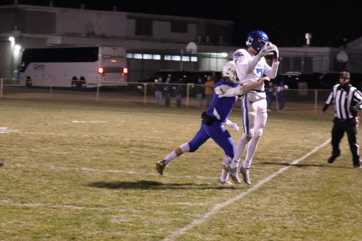 Ethan Lisman keeps his feet inbounds after catching a pass versus Fall River.