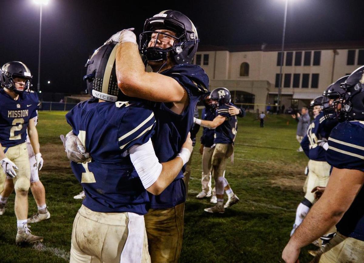 Mission Prep players celebrate after beating Fresno Christian for the Central Section CIF Les Schwab 8-man football championship.