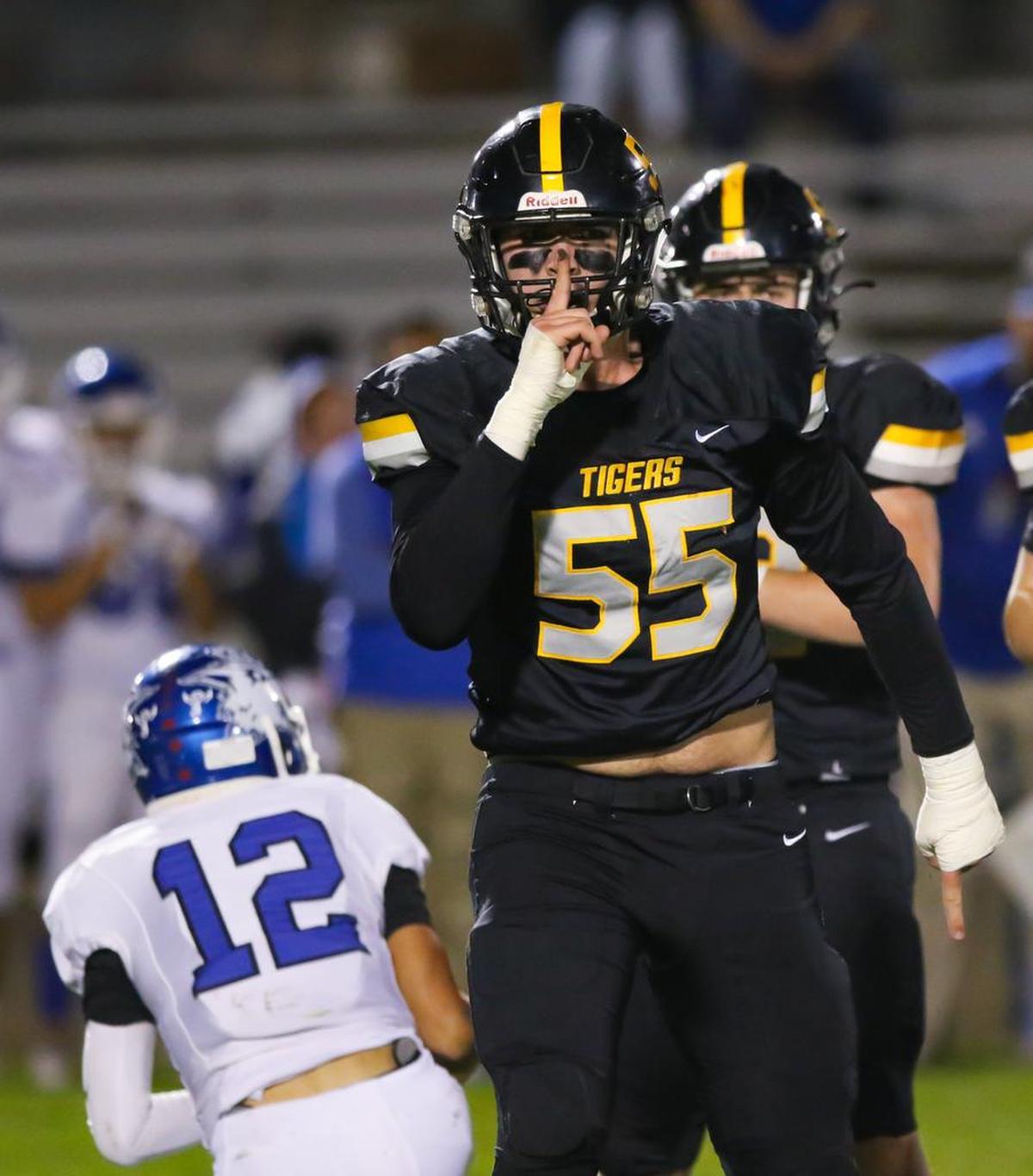 Thomas Cole (55) had several sacks or key tackles as San Luis Obispo High School beat Madera 49-28 to advance to the CIF-Central Section Division 3 semifinals in 2019. Cole left SLO High early to play football and attend classes at UCLA.