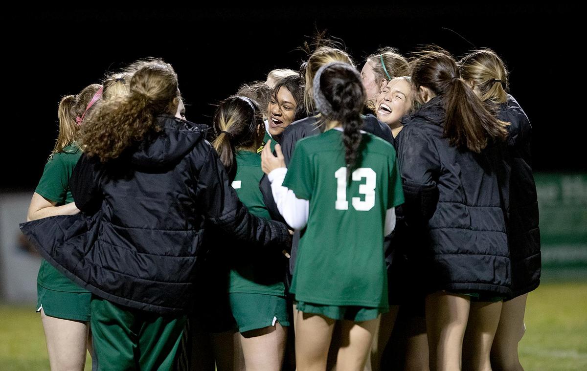 Templeton High School girls soccer team beat Nipomo High School in sudden death. Audrey Lerma (19) is mobbed by her teammates after kicking the winning goal.