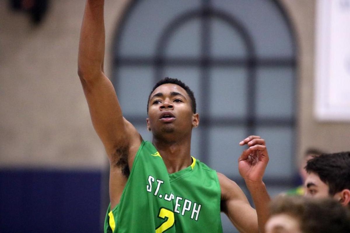 St. Joseph senior Elihu Cobb, pictured here during a game last season against Mission Prep, has 31 dunks in 20 games this season.