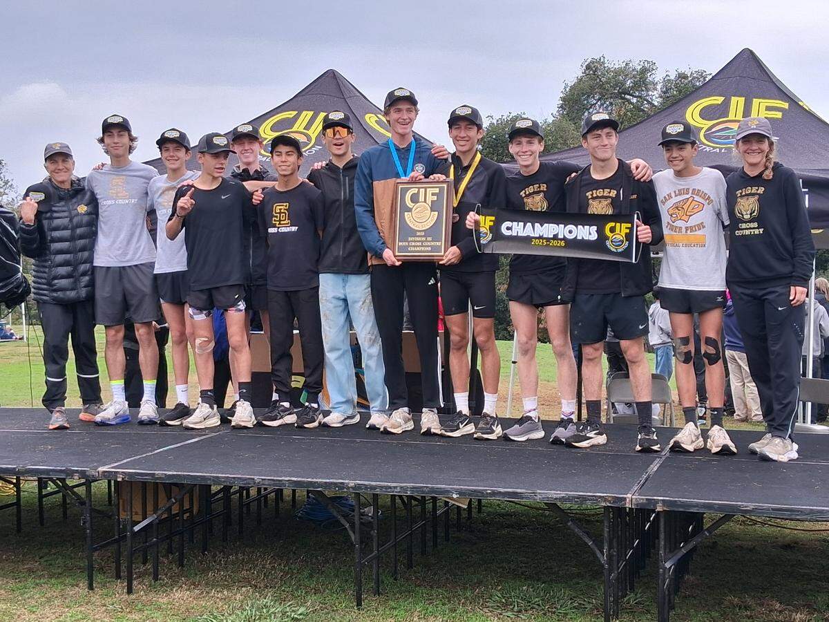 SLO boys cross country celebrates its CIF-Central Section title.