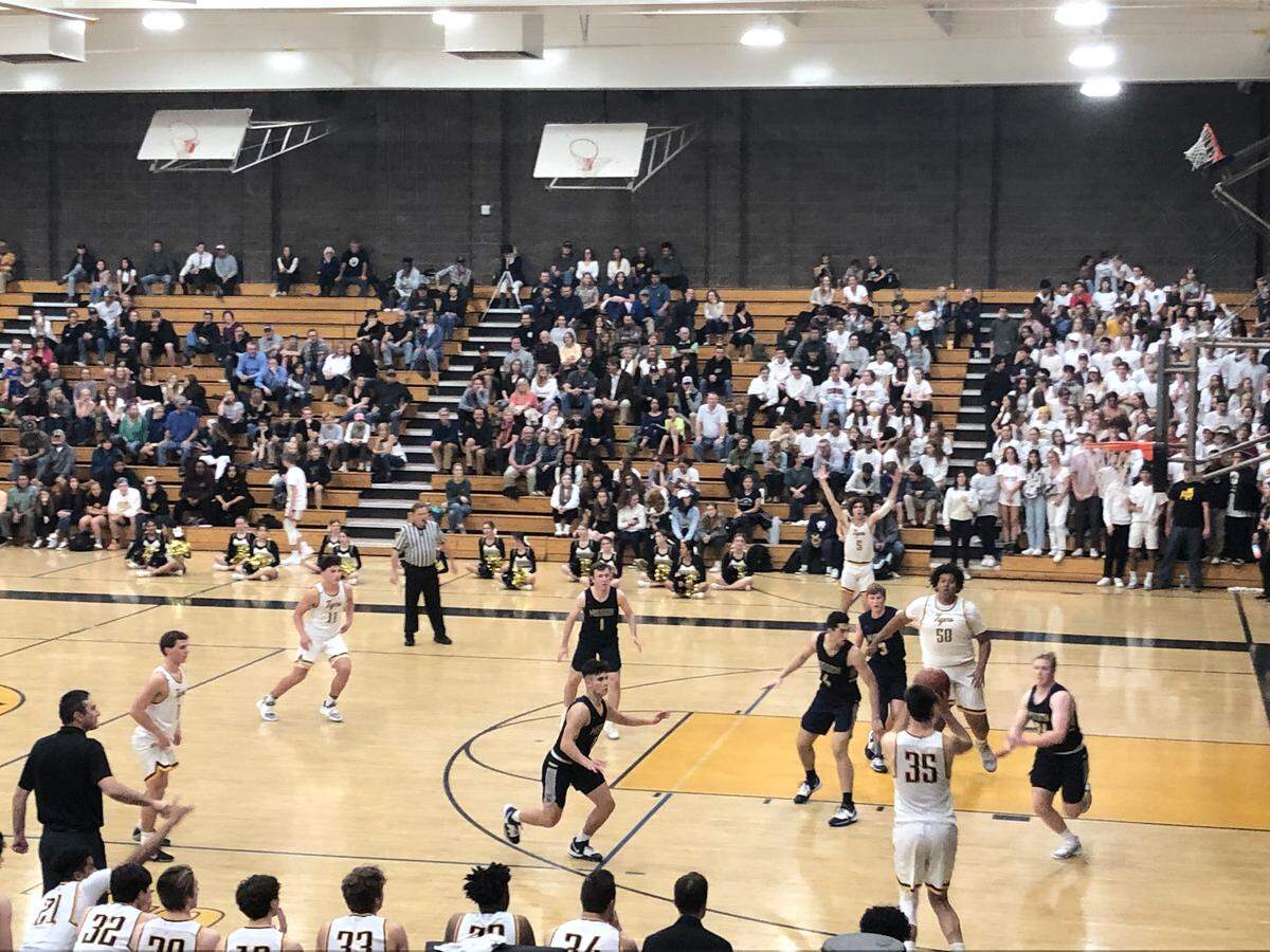 Carson Leedom of San Luis Obispo High shoots a three-pointer in a win against Mission Prep earlier this month.