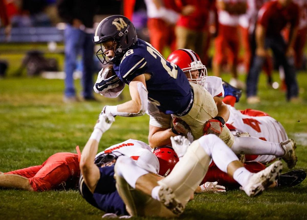 Mission Prep running back Brian Kowall dives for extra yardage in the Royals’ CIF-Central Section 8-man semifinal playoff game against Riverdale Christian in San Luis Obispo.