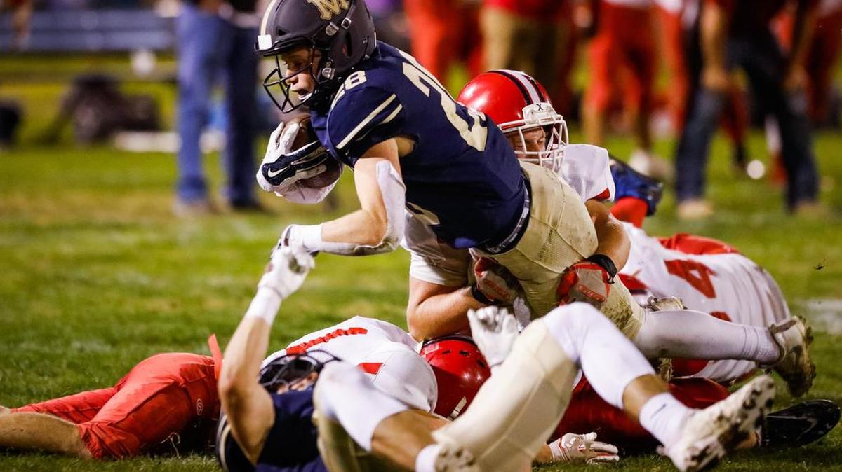 Mission Prep running back Brian Kowall dives for extra yardage in the Royals’ CIF-Central Section 8-man semifinal playoff game against Riverdale Christian in San Luis Obispo.