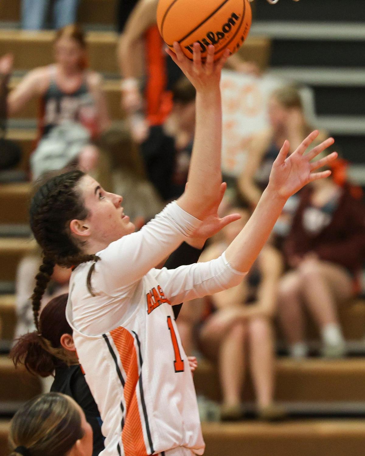 Jacey George shoots. Atascadero girls beat Mendota in a playoff basketball game on Feb. 18, 2025.