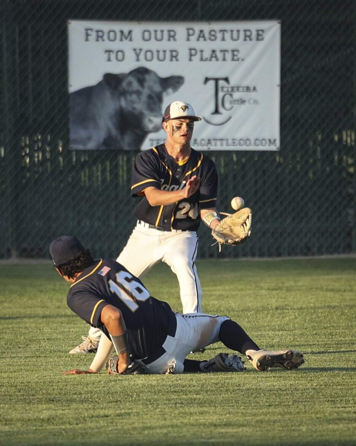 A fly falls between Ruben Servin and Tanner Bournonville. St. Joseph beat Arroyo Grande High School 5-4 n a baseball game on April 17, 2026