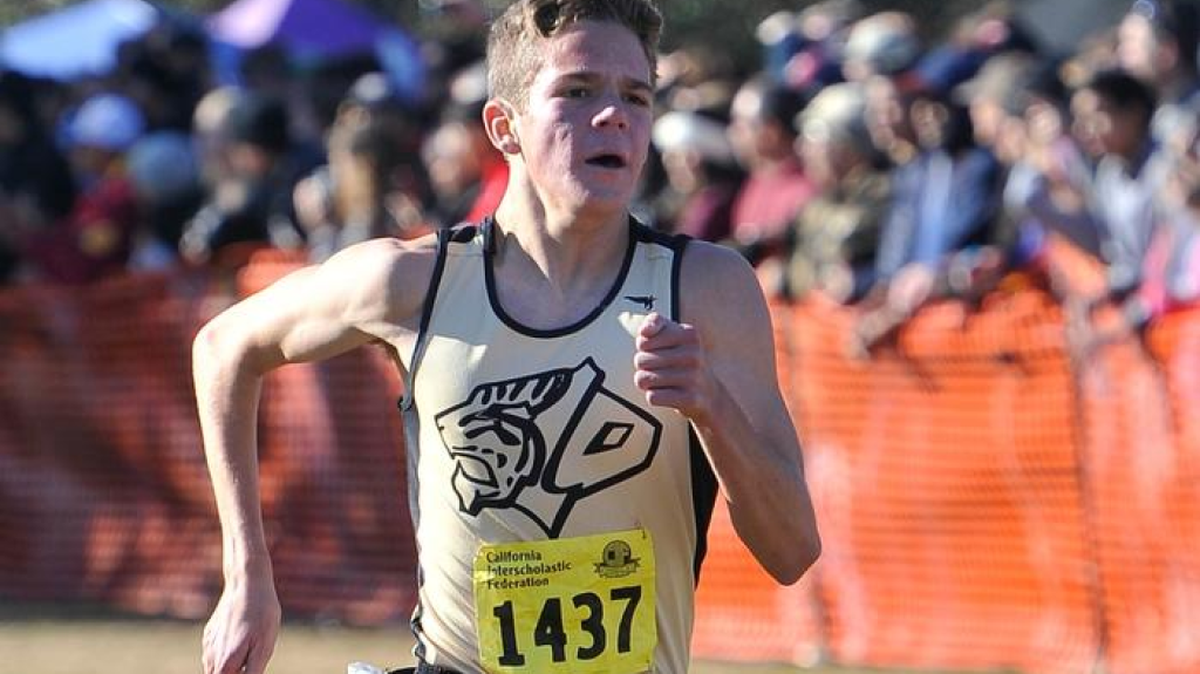San Luis Obispo High’s Callum Bolger closes on the finish line during Saturday’s CIF-State Cross Country Meet at Woodward Park in Fresno. Bolger finished second in Division 3.