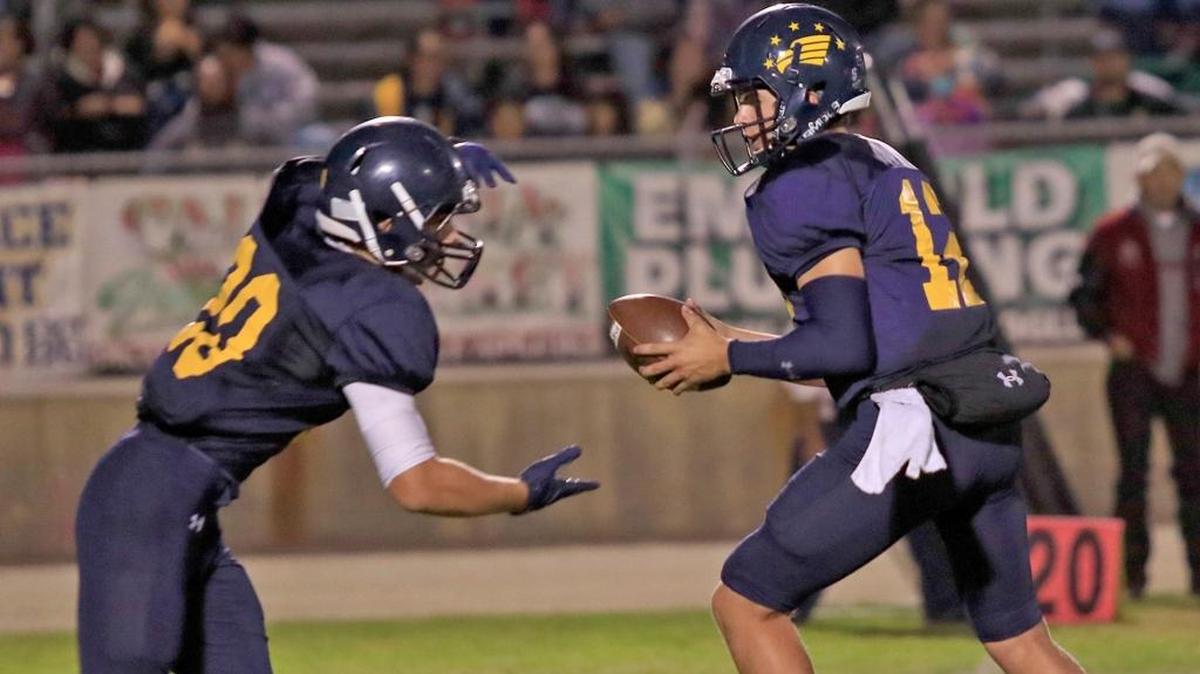 Arroyo Grande High School running back James Gilmet (left), shown here earlier this season against Nipomo, had a stellar performance in the Eagles’ 42-13 loss in a first-round CIF-Southern Section Division 2 playoff game against Oaks Christian in Westlake Village.