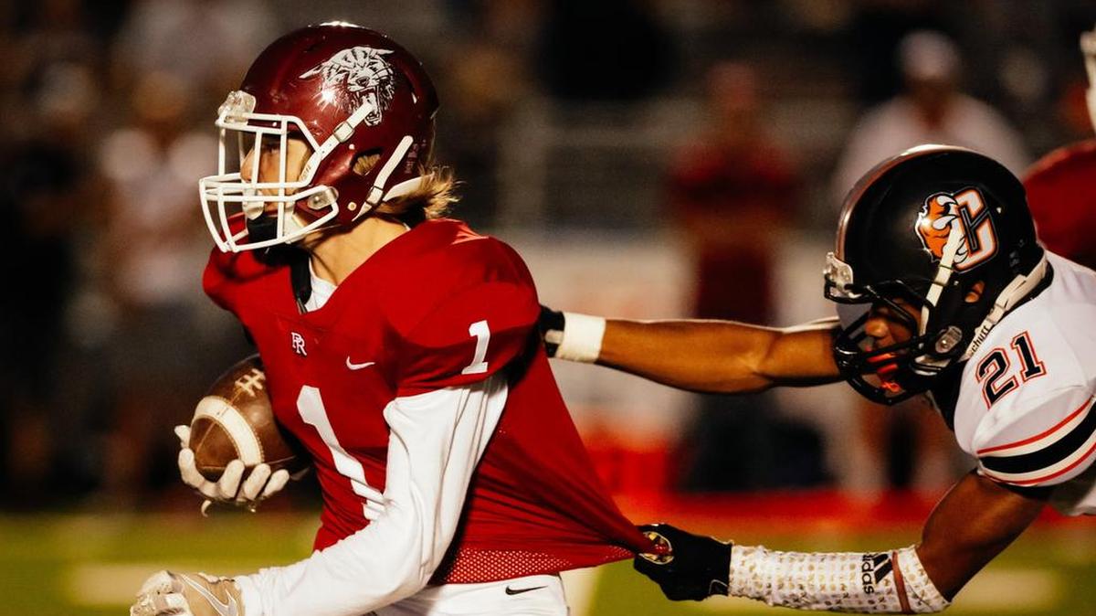 Seth Maldonado (1) carries the ball for Paso Robles High during a nonleague football game against Central earlier this season.