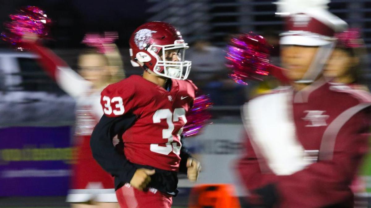 Will Goldammer runs out onto the field between the band and cheerleaders. Arroyo Grande traveled to Paso Robles in the opening game of Mountain League play in week 8 of the season. David Middlecamp 10-11-2019