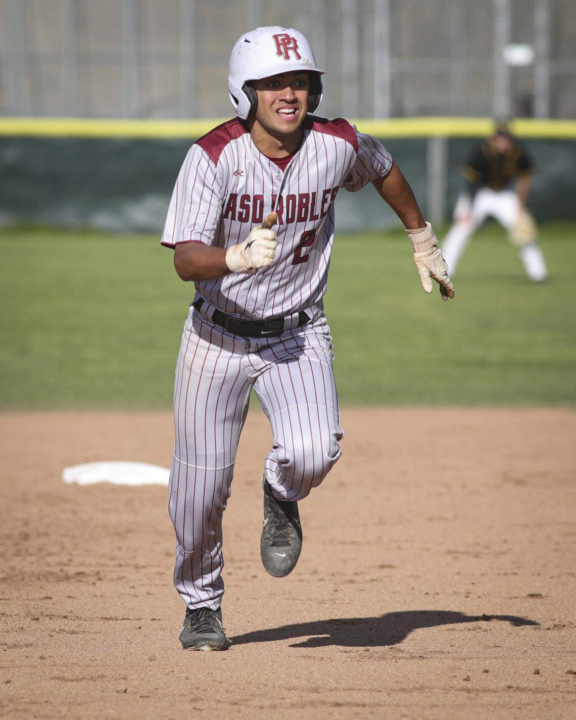 Jaiden Soboleski moves to third base. San Luis Obispo beat Paso Robles 5-4 in a high school baseball game April 23, 2026