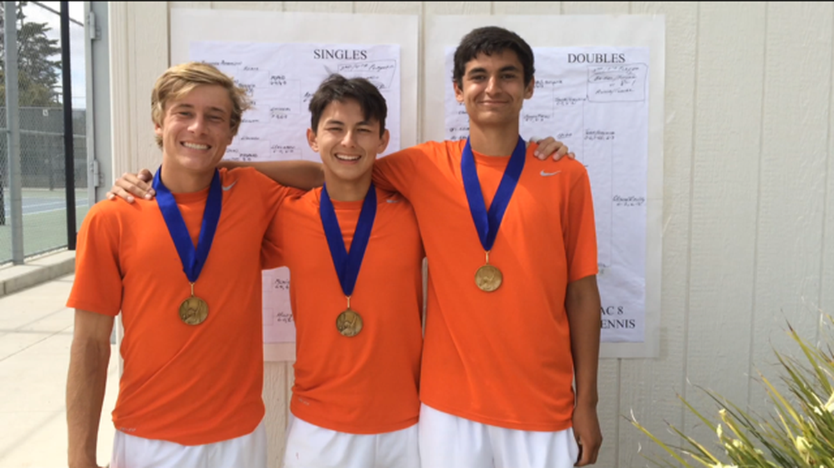 From left, Brendan Adams, Yuma Olsen and Luke Reilly celebrate Atascadero’s sweep.