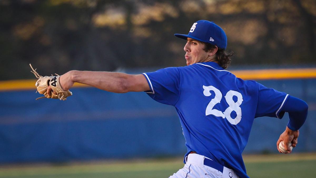 Morgan Codron pitches for the Pirates. Morro Bay Pirates won 11-1 over Nipomo Titans in boys high school baseball March 22, 2022.