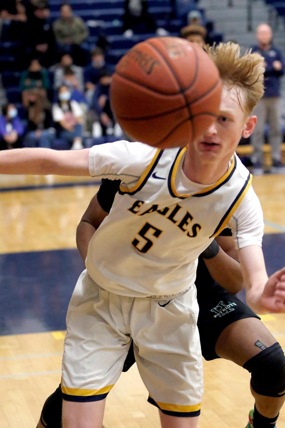 Arroyo Grande’s boys basketball team lost to Hoover of Fresno 68-63 in a first round CIF-Central playoff game. Brody Naber (5) tries to keep the ball from going out of bounds.