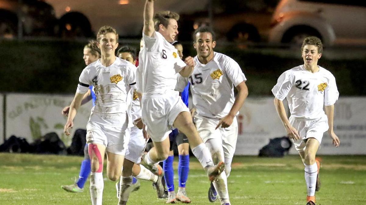 San Luis Obispo High’s Branden Bolezal (6) celebrates a late goal by the Tigers in a 3-1 win over Arroyo Grande on Friday. Following Bolezal are Cole Halman (4), Emmitt Fox-Pendergrast (15) and Grayson Stewart (22).