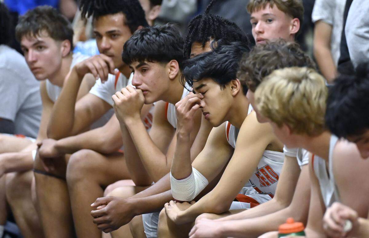 Atascadero watches as Clovis High is recognized the CIF Central Section 2025-2026 DII Boys Basketball Champions Friday, Feb. 27, 2026 at Selland Arena in Fresno.