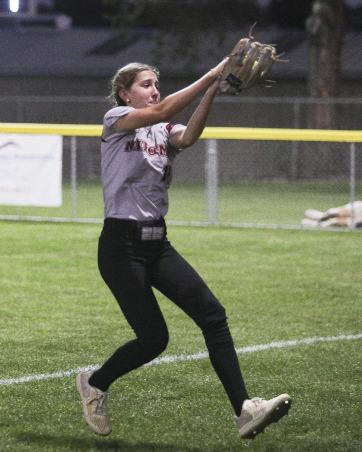Roxanne McLean makes a catch in foul ground. Nipomo beat Paso Robles 3-1 in a softball game delayed by heat on March 17, 2026.