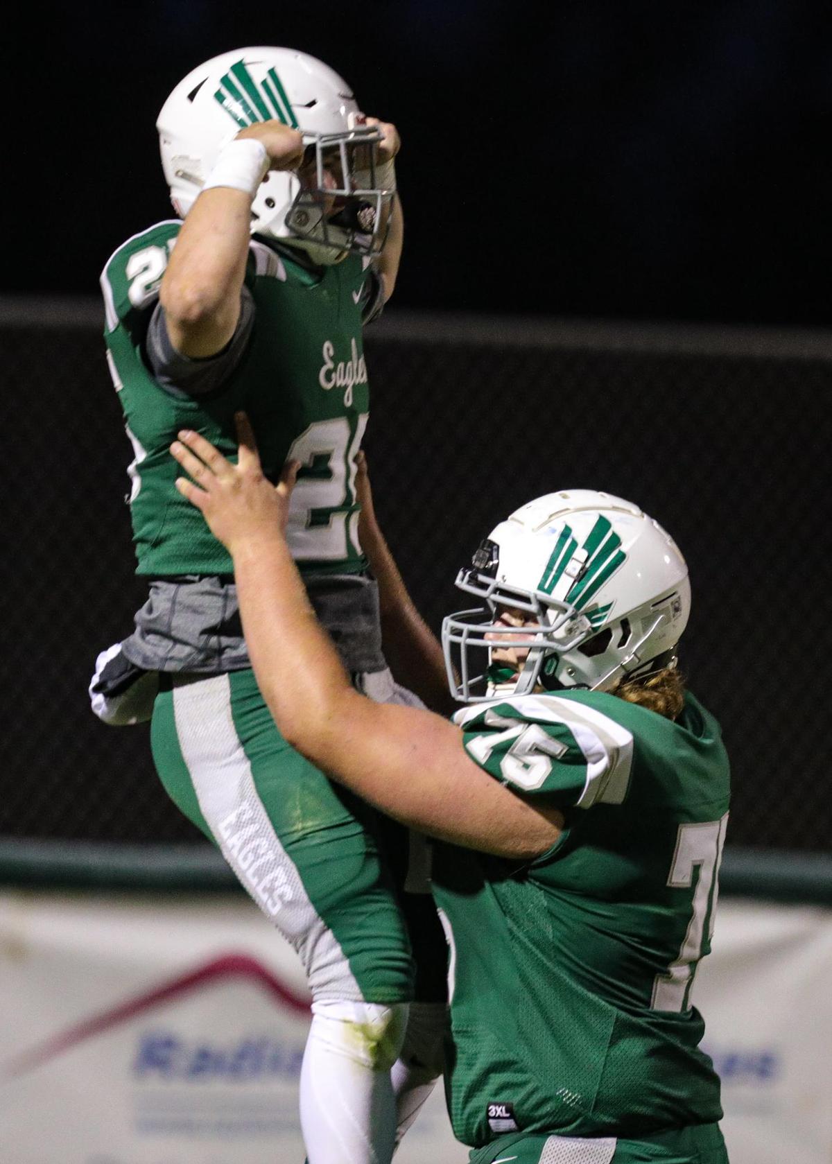 Chase Richards lifts Tyler Kaschewski up after the quarterback ran for a touchdown this spring. Templeton High School hosted Arroyo Grande in a battle of the Eagles football teams. Richards will play in this weekend’s FCA All-Star game.
