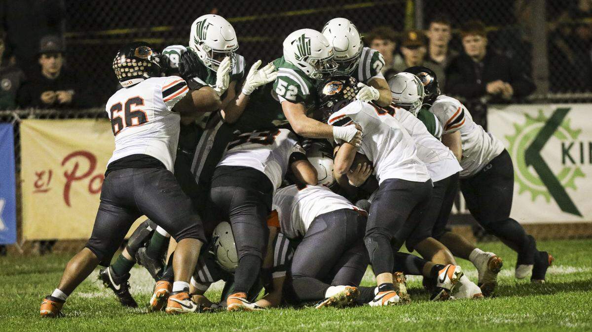 The Eagles made a goal line stop of the Horned Toads at the end of the first half. Garret Davis and Tyler Cunningham are among those in on the stop of Gracin Redding. Templeton beat Coalinga 40-14 in a playoff football game Nov. 14, 2025.