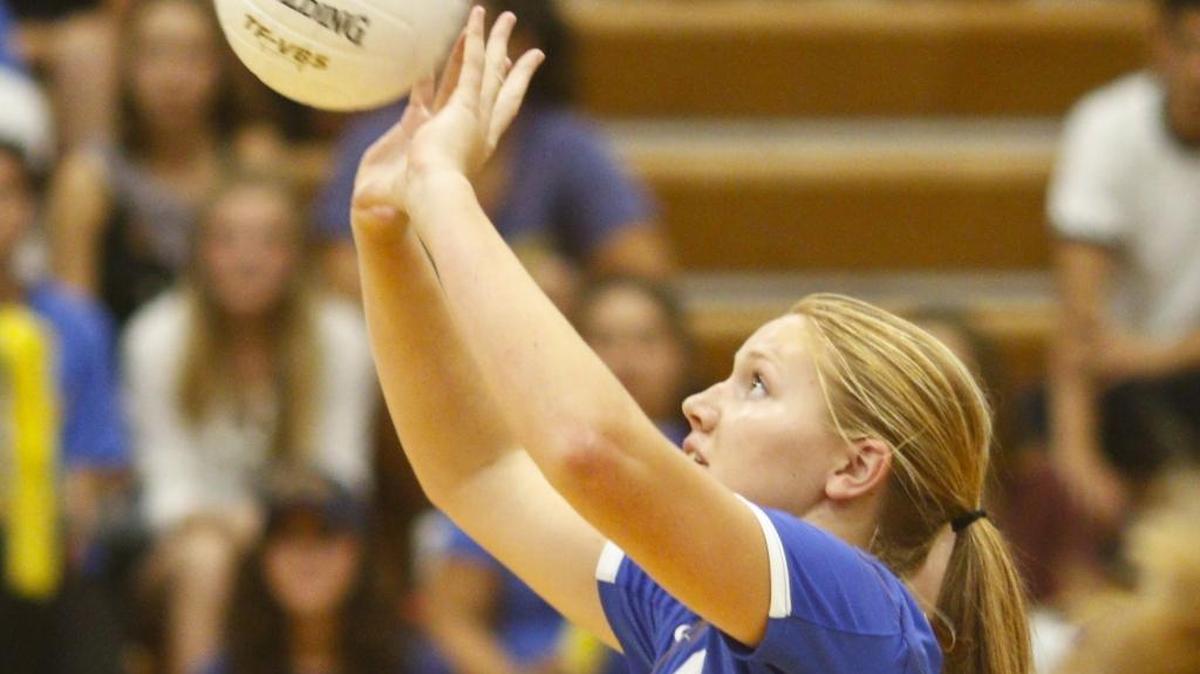 Ashlyn Herlihy of Arroyo Grande High School sets in a girl’s volleyball game against San Luis Obispo on Sept. 24.