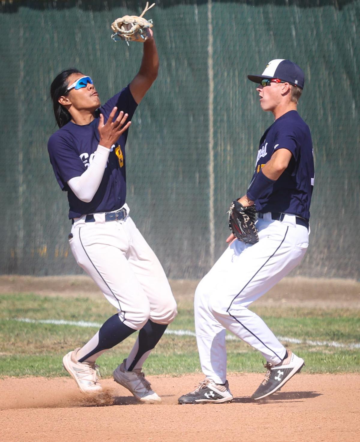 Josiah Cabrero calls off Ryan Tayman for a pop up in 2021. Arroyo Grande hosted Madera in the CIF Division 2-Central Section Championship. Tayman has committed to play baseball at Cal.