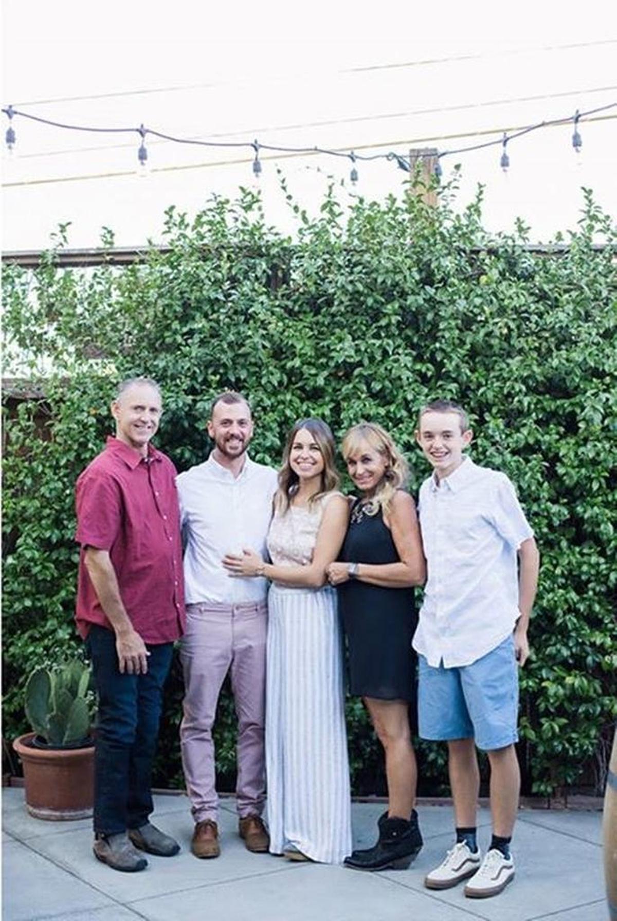 (From left) The late Steve Grey stands with his family including son-in-law Cameron, daughter Whitnie, wife Tiffani and son Colby.