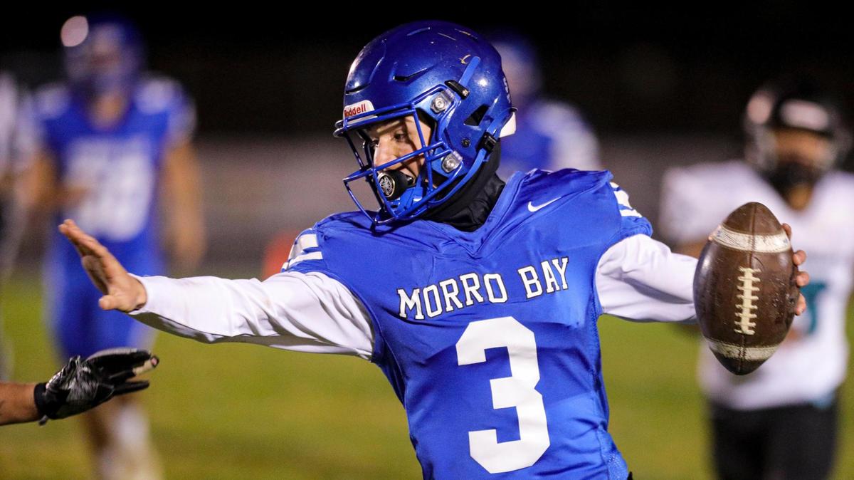 Quarterback Nicky Johnson scrambles for yardage in Morro Bay’s 29-26 semifinal win over Pioneer Valley in the CIF-Central Section football playoffs on Nov. 19, 2021.