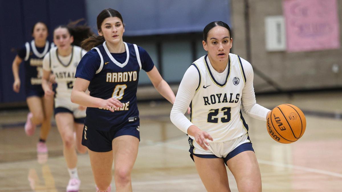 K.K. Guy dribbles on a breakaway as Mission Prep girl’s basketball team beat Arroyo Grande 55-51 on Feb. 11, 2025.