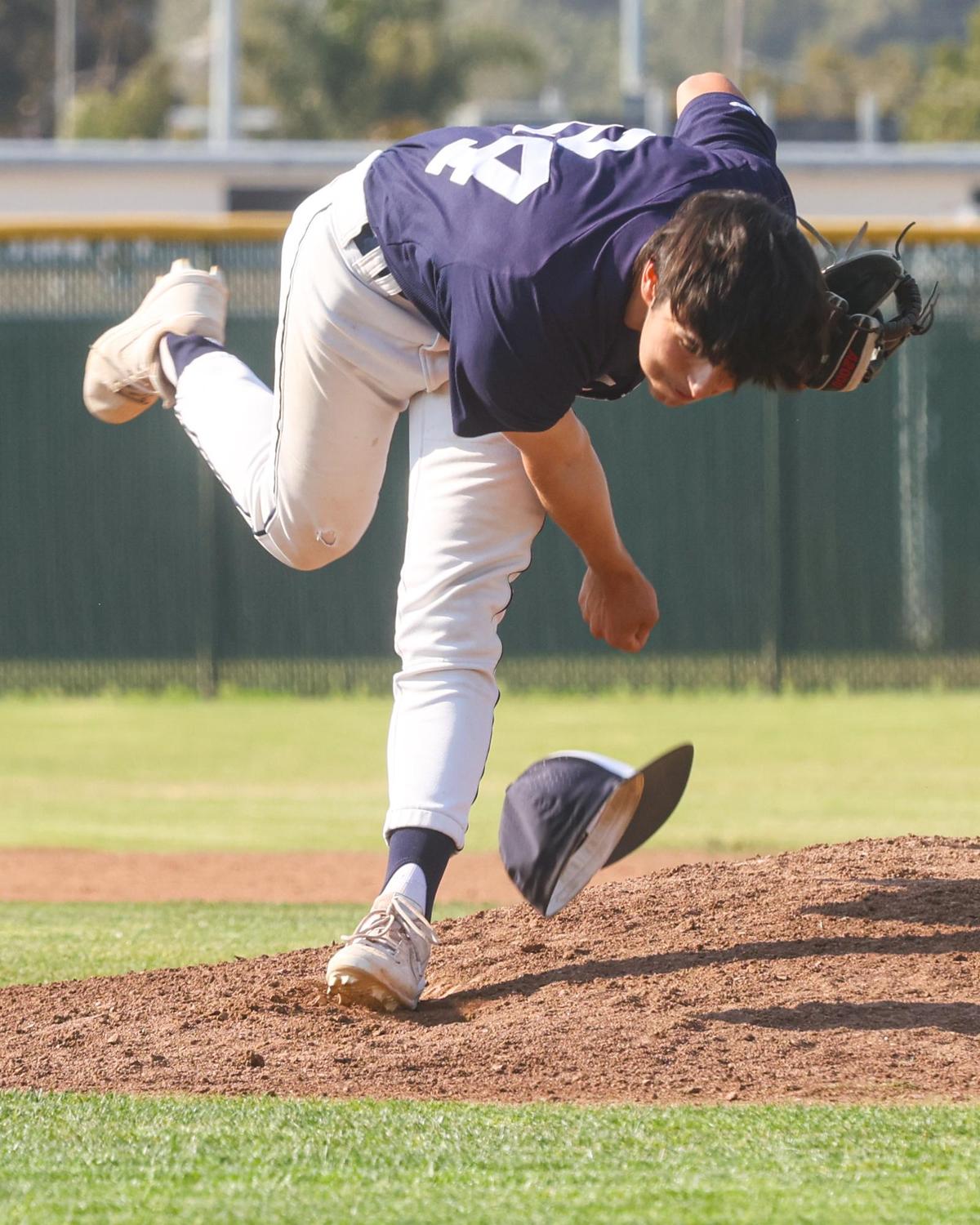 Marc Byrum’s hat falls off as he pitches. Arroyo Grande hosted Paso Robles in a playoff baseball game in the delayed COVID-19 season.