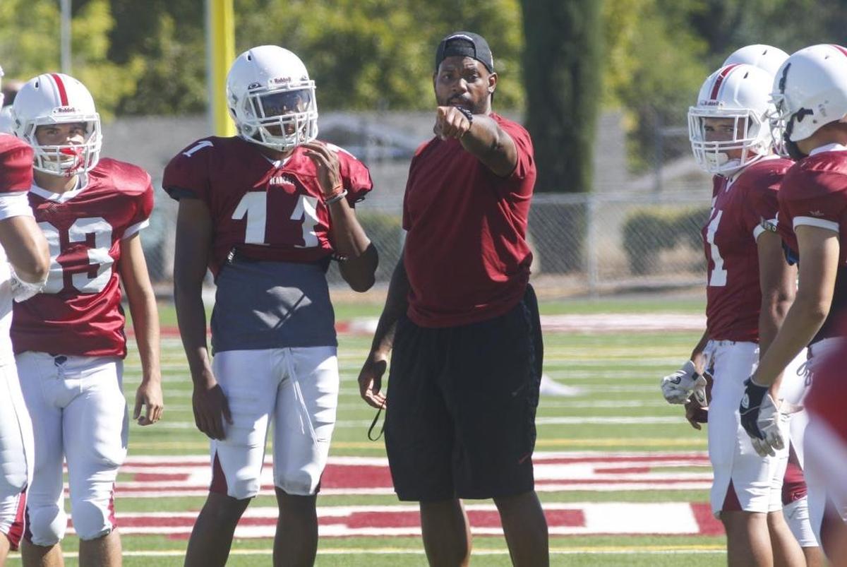 Paso Robles High head coach Larry Grant leads his team during preseason practice. David Middlecamp 8-14-2017