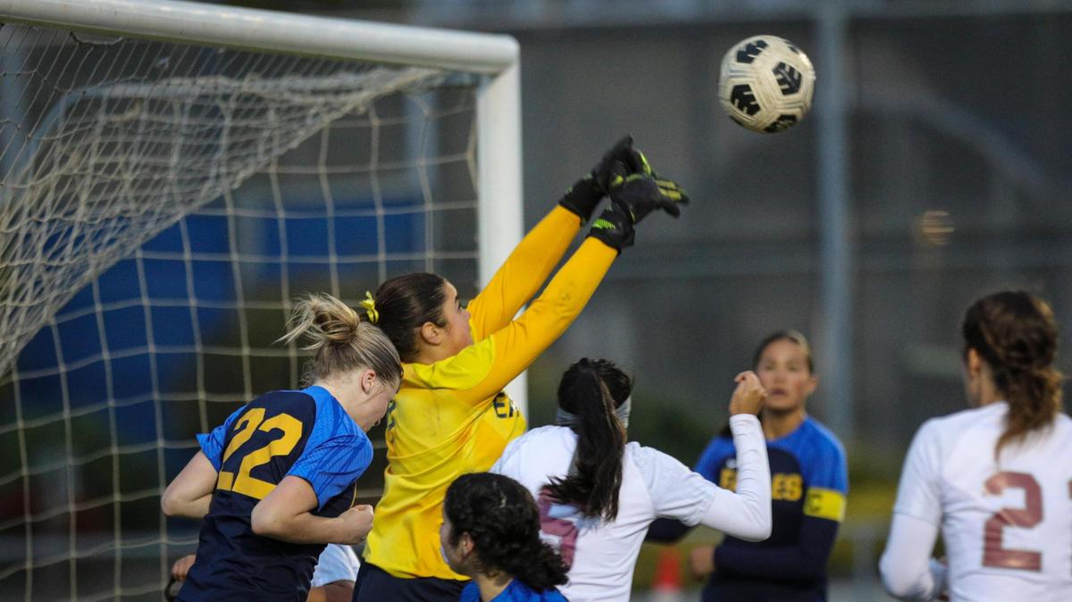 Arroyo Grande keeper Jenelle Guey-Mock prevents the ball from finding the net. Arroyo Grande girls won 2-0 over Estancia on Feb. 29, 2024, to advance to the 2024 CIF SoCal Division IV Girls Soccer Championship.