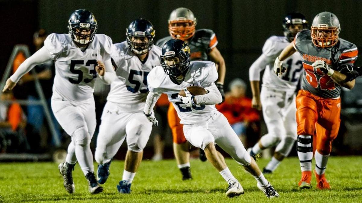 Arroyo Grande running back Bradley Mickey, center, is part of the Eagles’ potent rushing attack, along with Alex Cecchi and Joey DeLaRosa.