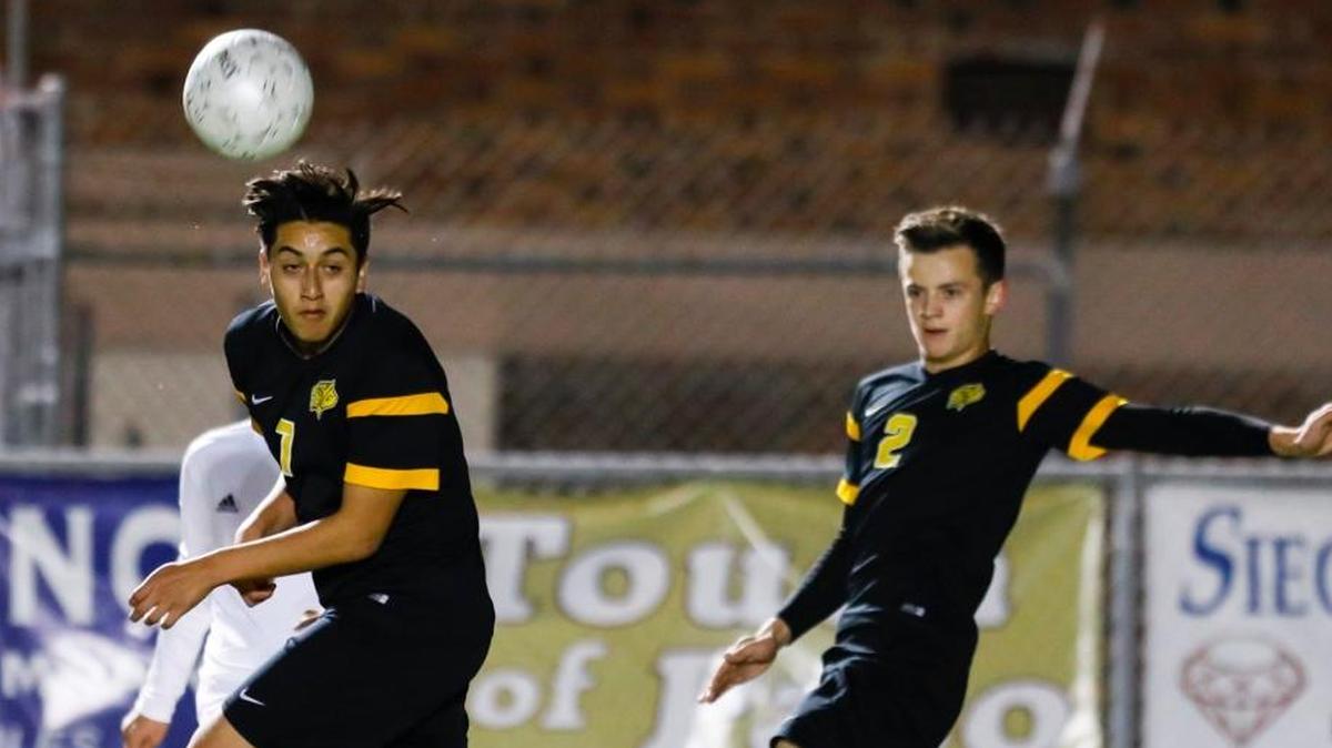The San Luis Obispo High School boys soccer team plays Paso Robles on Jan. 26. SLO High was forced to forfeit 10 games and a PAC 8 championship for violating CIF-Southern Section rules.