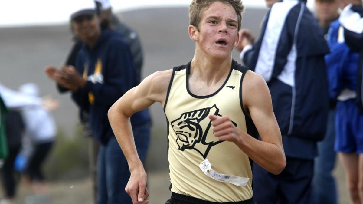 San Luis Obisbo High’s Callum Bolger nears the finish line at the PAC 8 Cross Country Finals on Thursday at Cuesta College.