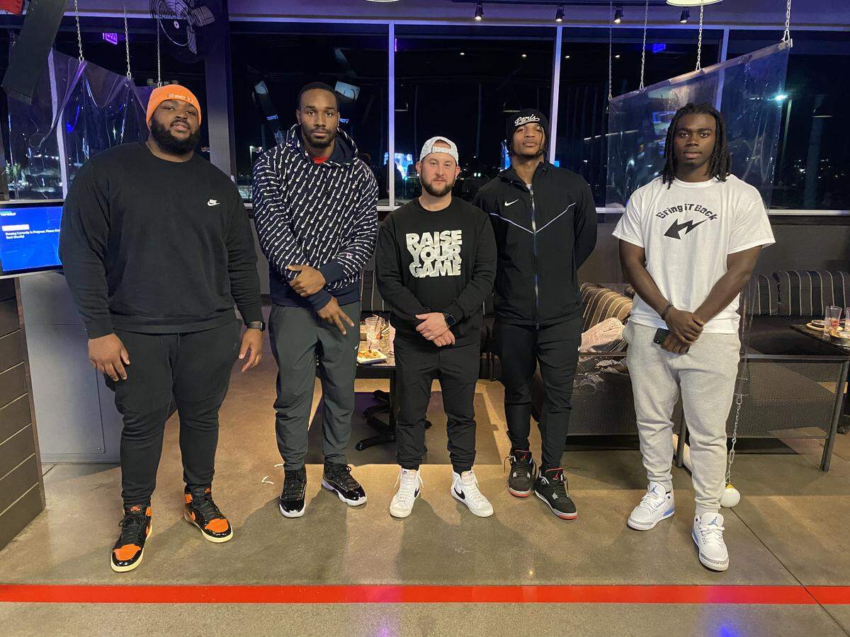 Brian Hannula (middle), a Mission Prep graduate and NFL sports agent, appears here from left to right with Tyler Shelvin (Cincinnati Bengals), Brennan Eagles (Dallas Cowboys and USFL), Jamar Chase (Cincinnati Bengals) and Rhamondre Stevenson (New England Patriots).