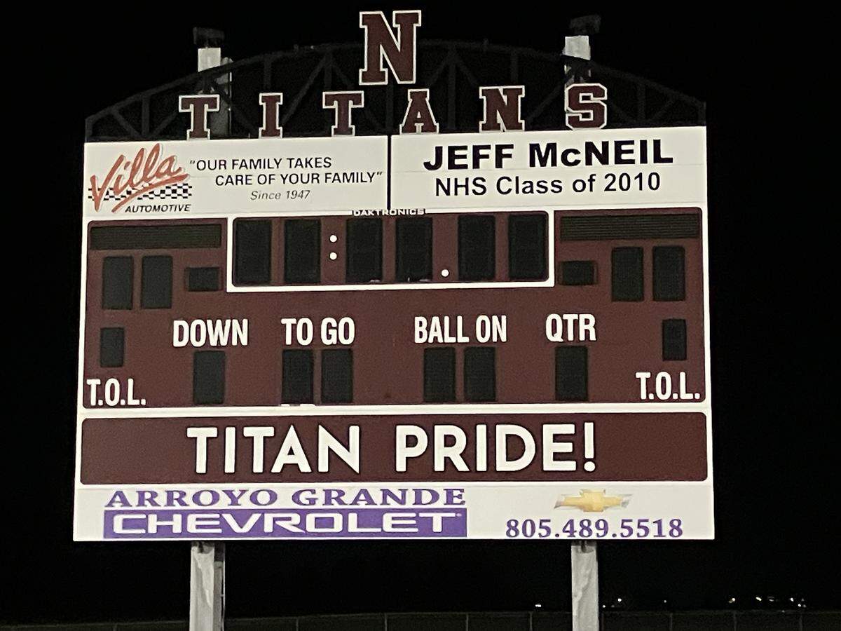 Nipomo High’s scoreboard recognizes Jeff McNeil among the sponsors.