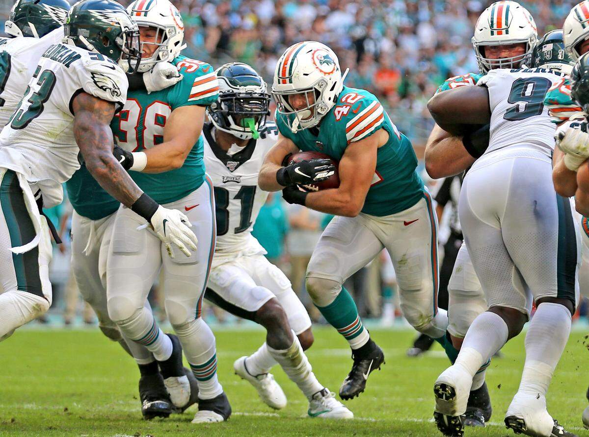 Miami Dolphins running back Patrick Laird (42) runs for a fourth quarter touchdown as they play the Philadelphia Eagles at Hard Rock Stadium Sunday, Dec. 1, 2019 in Miami Gardens, Fla. The Dolphins won, 37-31. (Charles Trainor Jr./Miami Herald/TNS)