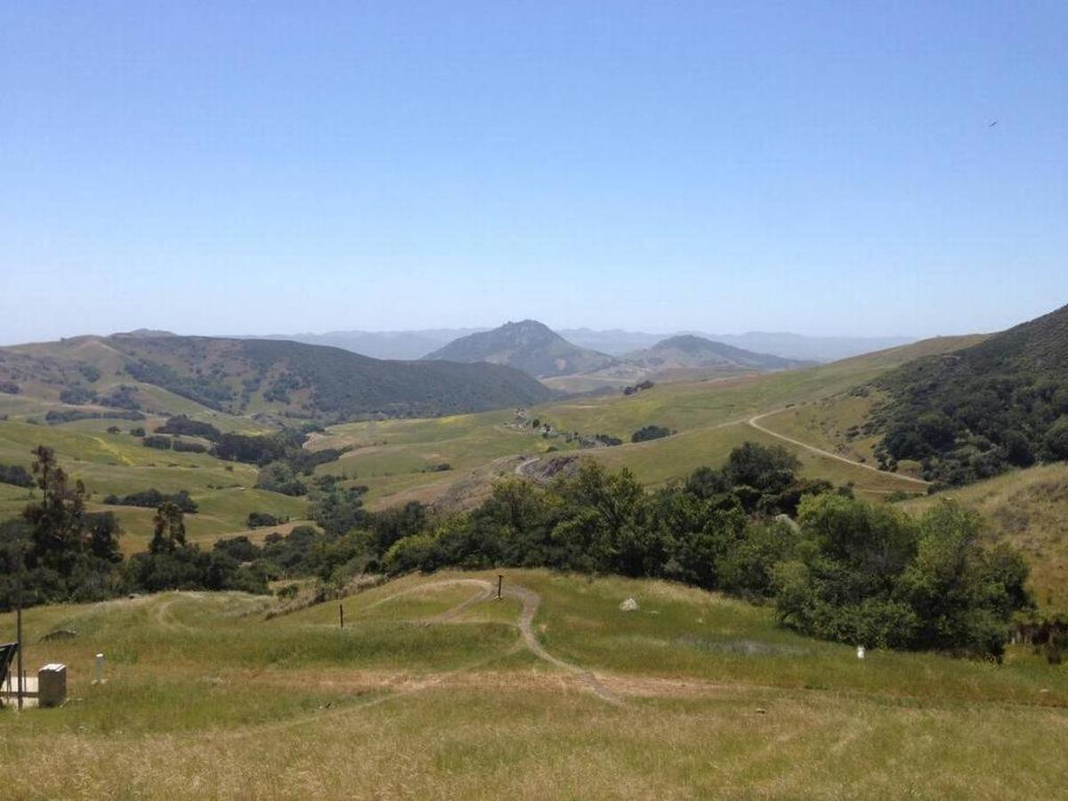A view from the Stenner Creek trail. Cerro Romauldo, one of the Seven Sisters, can be seen in the distance.