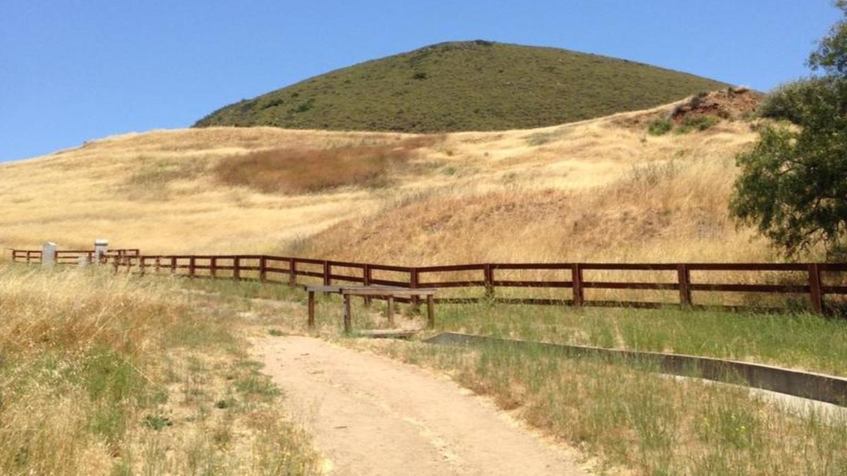 Those who hike Islay Hill’s 1.8-mile trail will be greeted with stunning views of Edna Valley in southern San Luis Obispo. The footbridge pictured above marks the beginning of the trail
