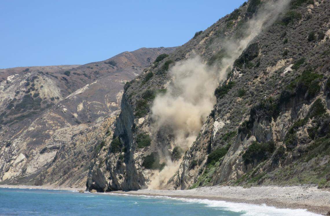 A rockslide on Santa Cruz Island results in clouds of dust on July 14, 2018. The largest of the Channel Islands, Santa Cruz Island is located off the coast of southern California.