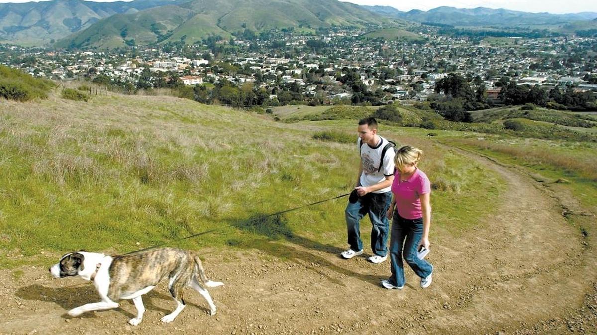 Hikers head up Cerro San Luis on a Saturday afternoon in San luis Obispo.