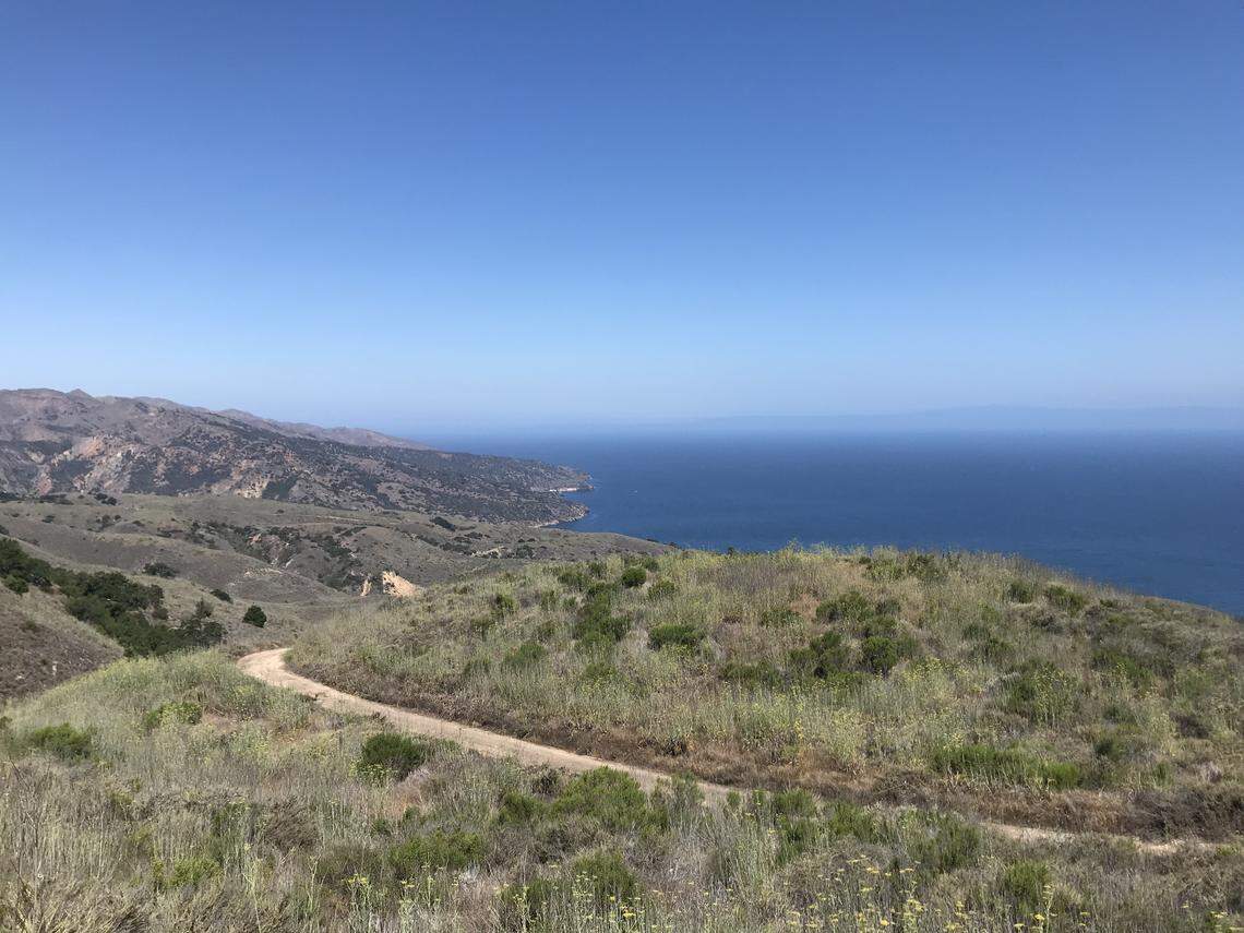 Navy Road covers rugged terrain on Santa Cruz Island with sweeping views of the coastline. Located off the coast of southern California, it's the largest of the Channel Islands.