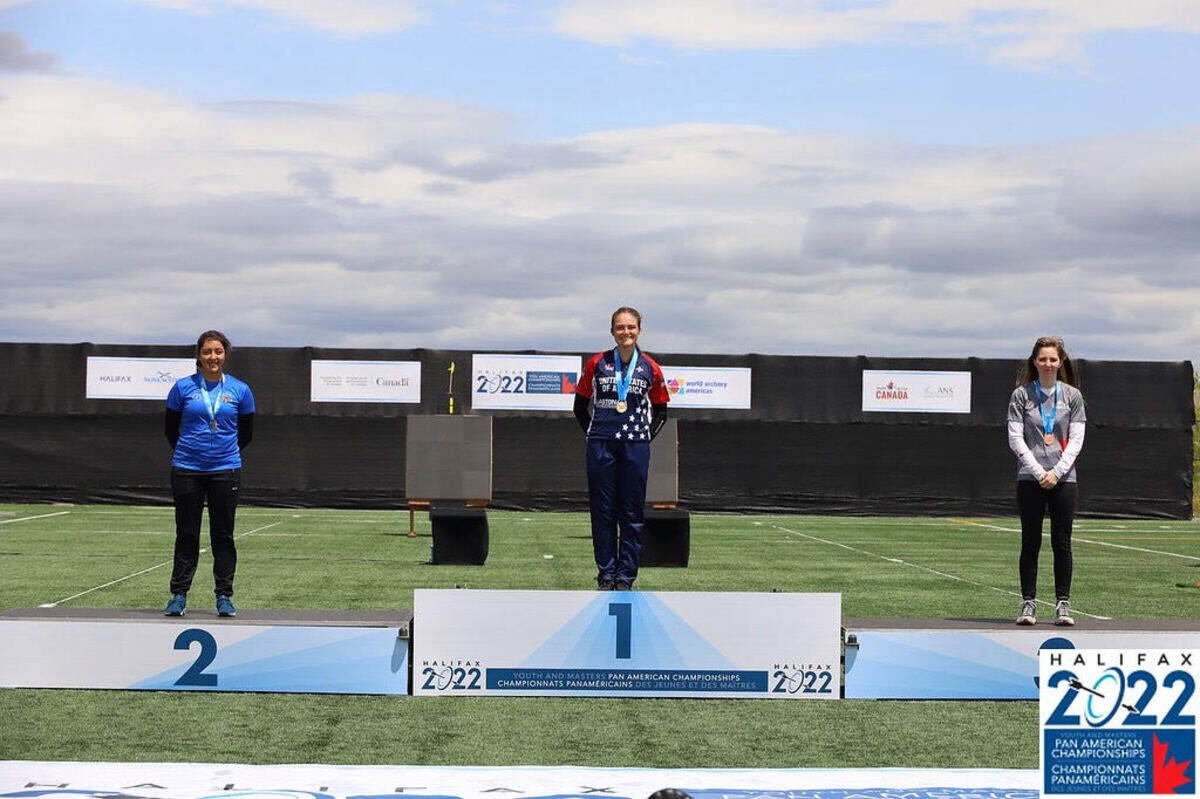Archer Bella Otter stands in the gold medal position after one of her two victories at the 2022 Youth and Masters Pan American Championships in Halifax, Nova Scotia, in June 2022.